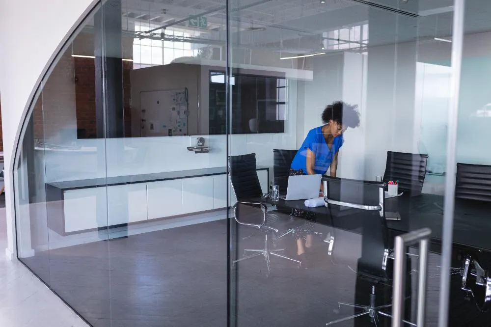 African American Business Woman In Meeting Room